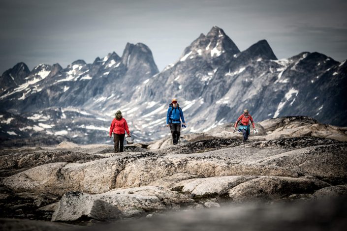 Three hikers in the mountains near Qernertivartivit not far from Kulusuk in East Greenland. Photo by Mads Pihl