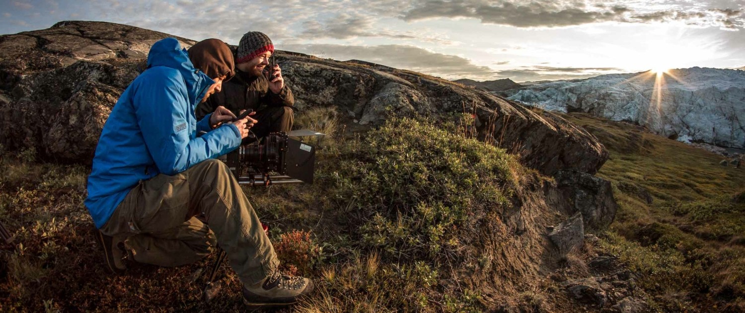 Film makers working at sunrise near Russell Glacier in Greenland. Photo by Mads Pihl - Visit Greenland