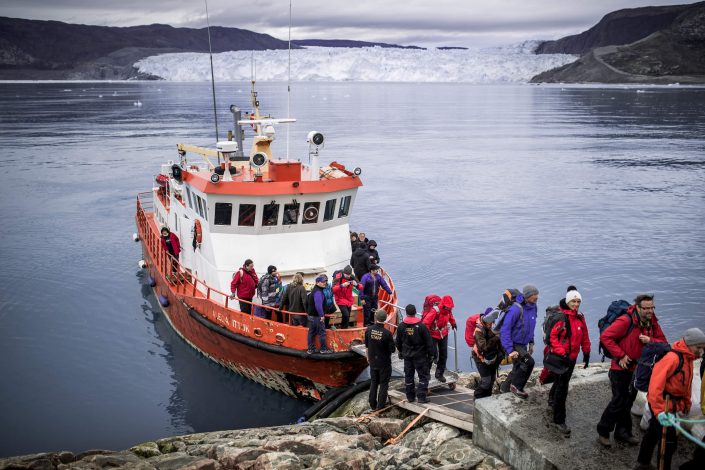 Passengers disembarking at Eqi Glacier Lodge in Greenland. Photo by Mads Pihl, Visit Greenland