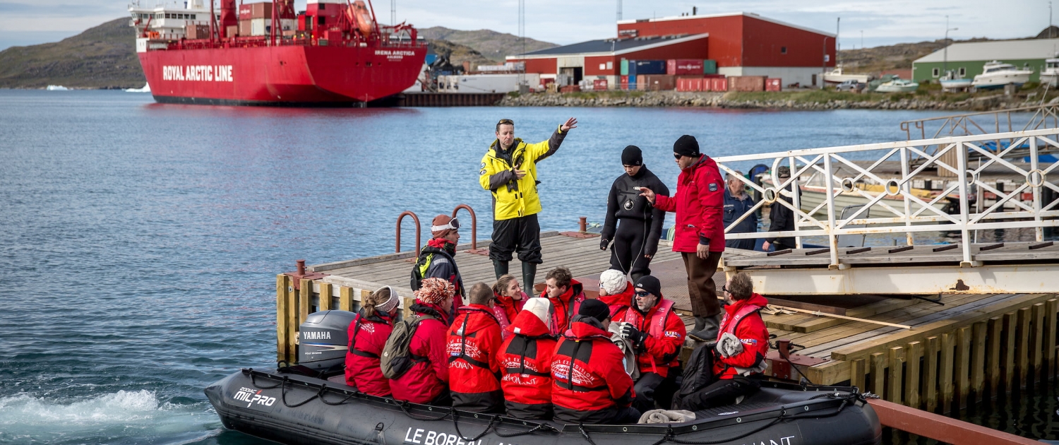 Cruise guests arriving by tenderboat in Narsaq in South Greenland.
