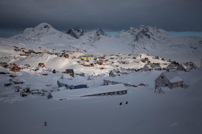 Morning light over Tasiilaq in East Greenland covered in deep snow