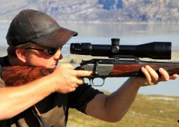 Hunter aiming with hunting rifle in Greenland. Photo by Major Hunting