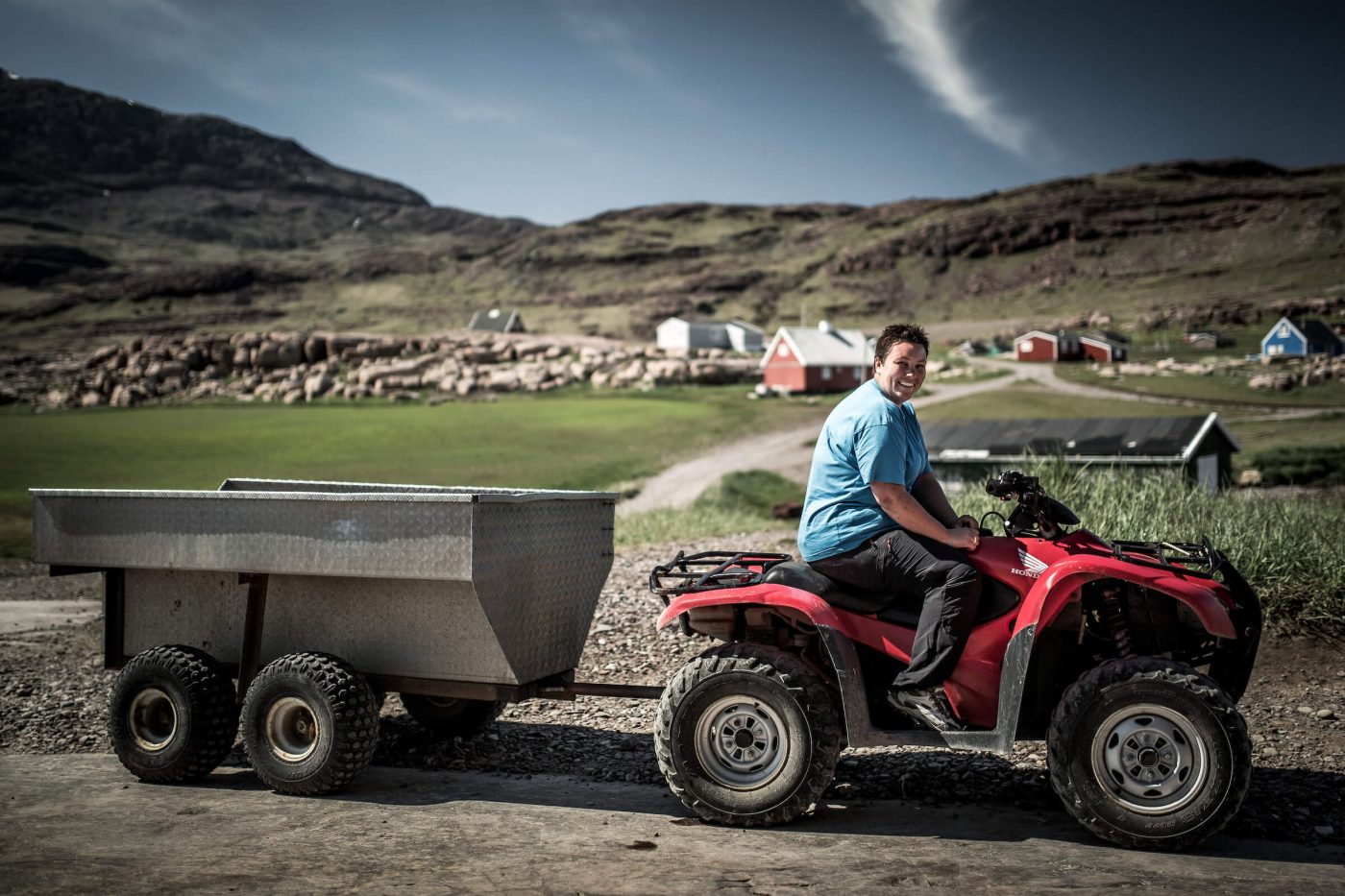 An employee from Igaliku Country Hotel driving with supplies from the local shop. Photo by Mads Pihl.