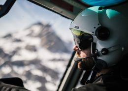 Helicopter pilot from Air Greenland on his way to top of Qingaaq mountain in Nuuk fjord. Photo by Filip Gielda