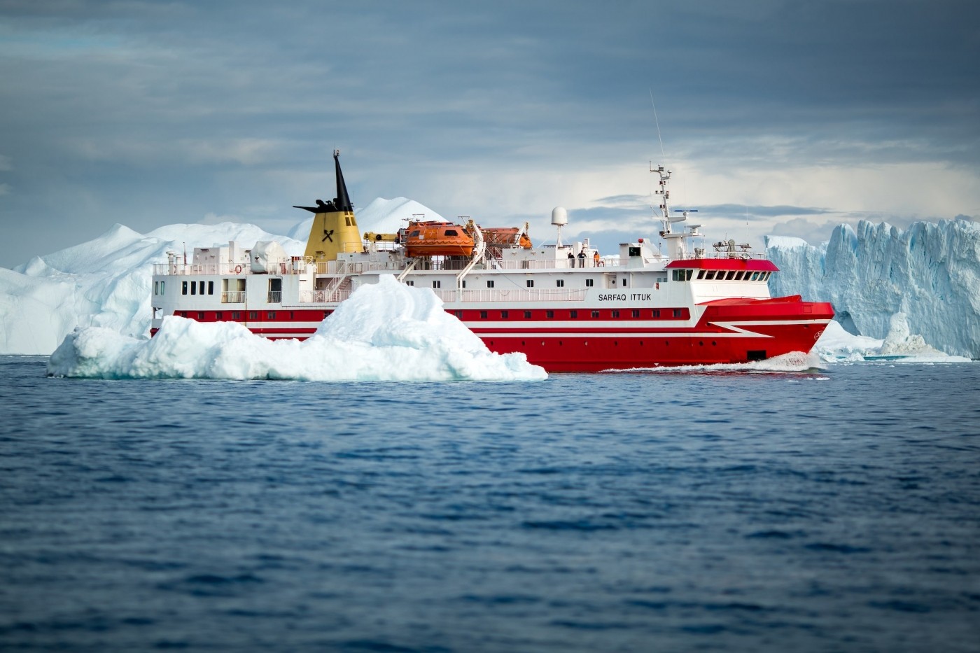 Sarfaq Ittuk, Greenland's passenger ferry, cruising along the edge of the Ilulissat ice fjord. By Mads Pihl