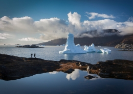 Two people trekking the Ilulissat icefjord. Photo by Paul Zizka, Visit Greenland
