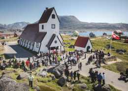 A large crowd of people gathered at the church in Nanortalik in South Greenland. Photo by Mads Pihl - Visit Greenland