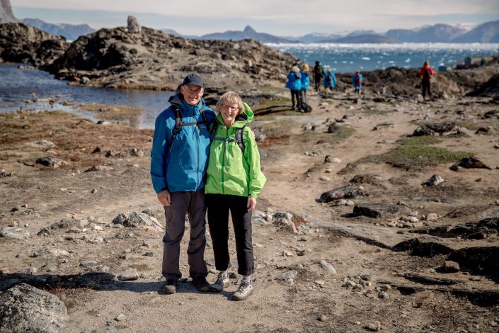 A couple hiking outside Uummannaq in Greenland. By Mads Pihl