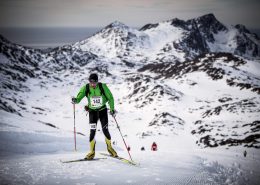 A skier climbing one of the many hills of the Arctic Circle Race. Photo by Mads Pihl, Visit Greenland