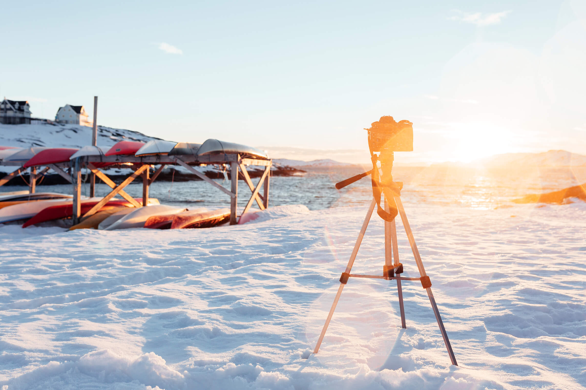 Camera on a tripod taking a timelapse of a sunset in Nuuk in Greenland. Photo by Rebecca Gustafsson