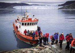 Passengers disembarking at Eqi Glacier Lodge in Greenland. Photo by Mads Pihl, Visit Greenland